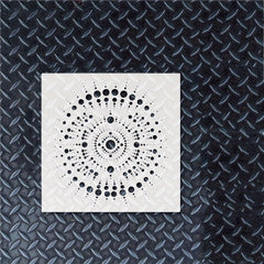 White square with black circular pattern on a textured black background
