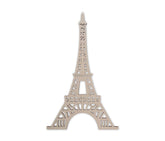 Metallic Eiffel Tower decoration on a white background