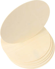 Beige round pastries stacked on a white background
