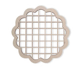Decorative metal grid with scalloped edge on a white background