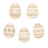 Set of six wooden Easter eggs with decorative patterns on a white background