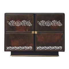 Decorative wooden cabinet with intricate carvings on a white background