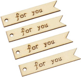 Four wooden tags with 'for you' text on a white background