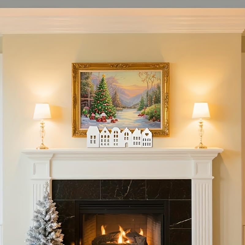 Festive fireplace with Christmas decorations, including a tree and framed artwork.