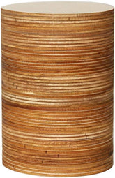 Round wooden stool with a striped pattern on a white background