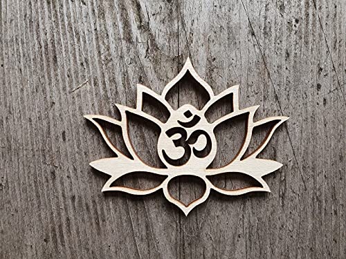 Wooden lotus flower with Om symbol on a wooden background