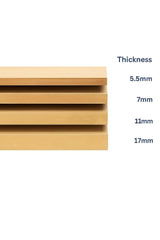 Wooden slats of different thicknesses on a white background
