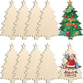Set of wooden Christmas trees with a decorated tree and Santa Claus figure on a white background.