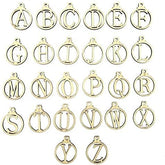 Gold letter pendants from A to Z on a white background