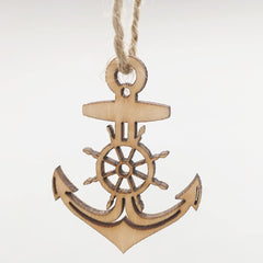 Wooden anchor and wheel ornament on a white background