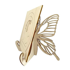Gold butterfly-shaped stand on a white background