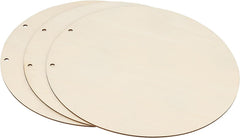 Three round wooden cutting boards with holes on a white background