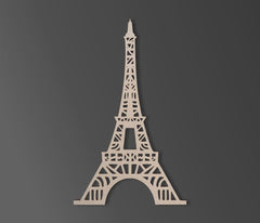 Beige Eiffel Tower model on a dark gray background