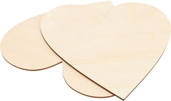 Three heart-shaped wooden cutouts on a white background