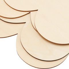 Set of round wooden cutouts with a plain background