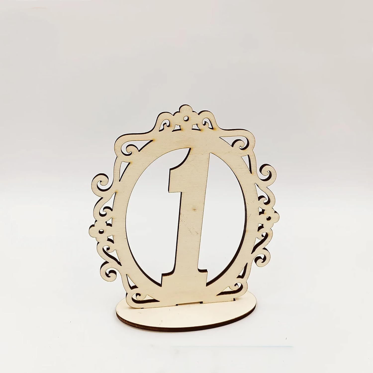 Wooden letter 'I' with decorative frame on a white background