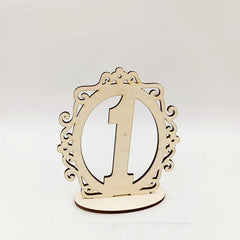 Wooden letter 'I' with decorative frame on a white background