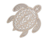 Decorative turtle-shaped cutout with intricate patterns on a white background