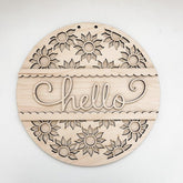 Wooden wall decor with floral patterns and 'hello' text on a white background