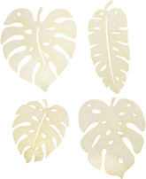Four beige tropical leaf coasters on a white background