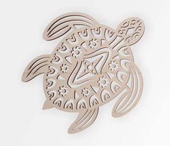 Decorative wooden turtle cutout with intricate patterns on a white background
