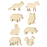 Set of wooden animal figures on a white background