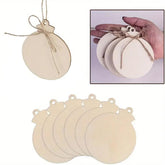 Set of beige round wooden tags with string, some assembled into pumpkins.