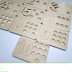 Wooden number templates from 1 to 10 on a light background