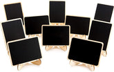 Set of small blackboards with gold stands on a white background