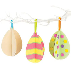 Three colorful Easter egg-shaped decorations hanging on a string against a white background.