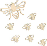 Set of gold bee-shaped decorations on a white background