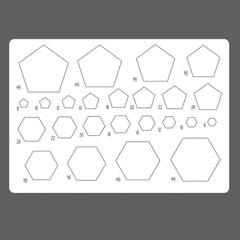 Sheet of pentagon and hexagon templates with measurements on a gray background