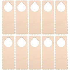 Nine beige door hangers with scalloped edges on a white background