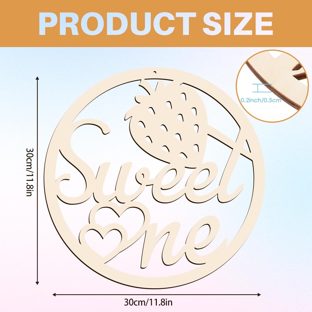 Wooden decorative item with 'Sweet One' text and measurements on a light blue background