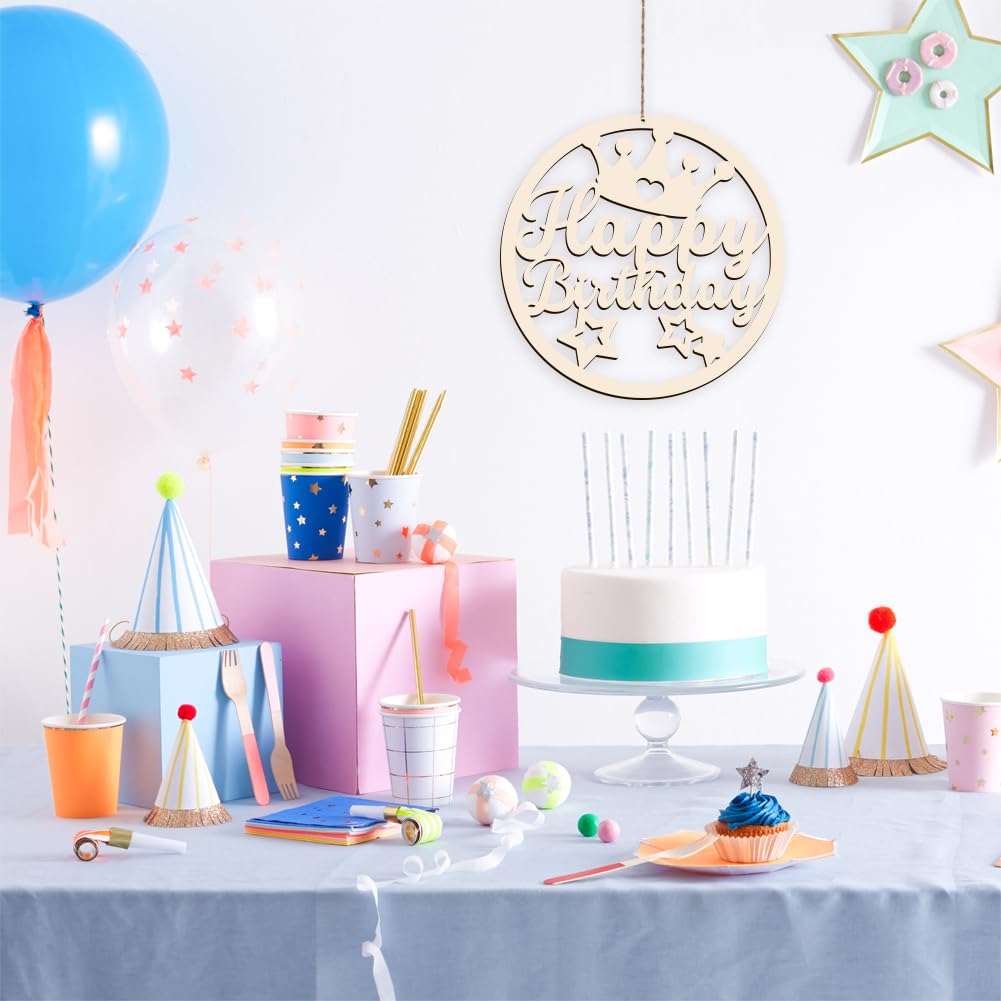 Birthday party setup with cake, balloons, and decorations on a table.