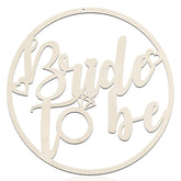 Decorative sign with 'Bride to be' text on a white background