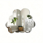 Decorative wall mirror with multiple reflective surfaces in a room setting.