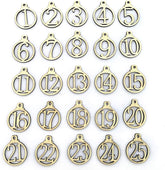 Set of gold number charms from 1 to 25 on a white background