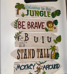 Decorative sign with motivational phrases and animal illustrations on a white background
