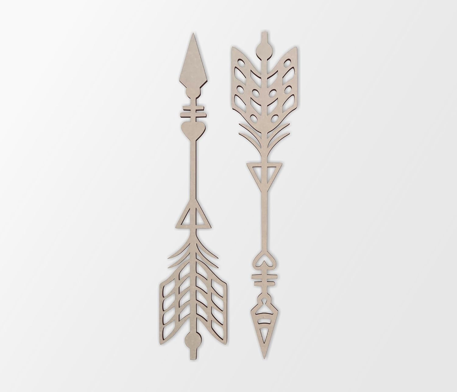 Two decorative arrow-shaped objects on a light gray background