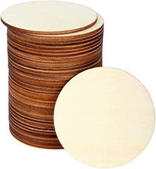 Stack of round wooden discs with a single disc on a white background