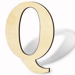 Gold letter 'Q' on a white background