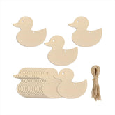 Set of wooden duck shapes with twine on a white background