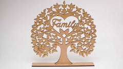 Wooden family tree decoration with 'Family' at the center on a white background