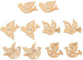 Wooden dove-shaped cutouts with intricate designs on a white background