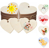 Stack of heart-shaped wooden tags with various designs on a white background