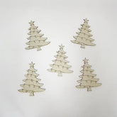 Four Christmas tree-shaped decorations with lights and stars on a light gray background