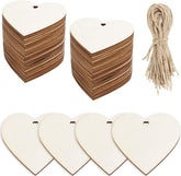 Heart-shaped wooden tags with string on a white background