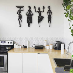 Decorative wall art of black women holding pots in a kitchen.