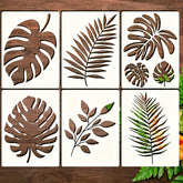 Set of leaf-shaped wooden coasters on a wooden surface